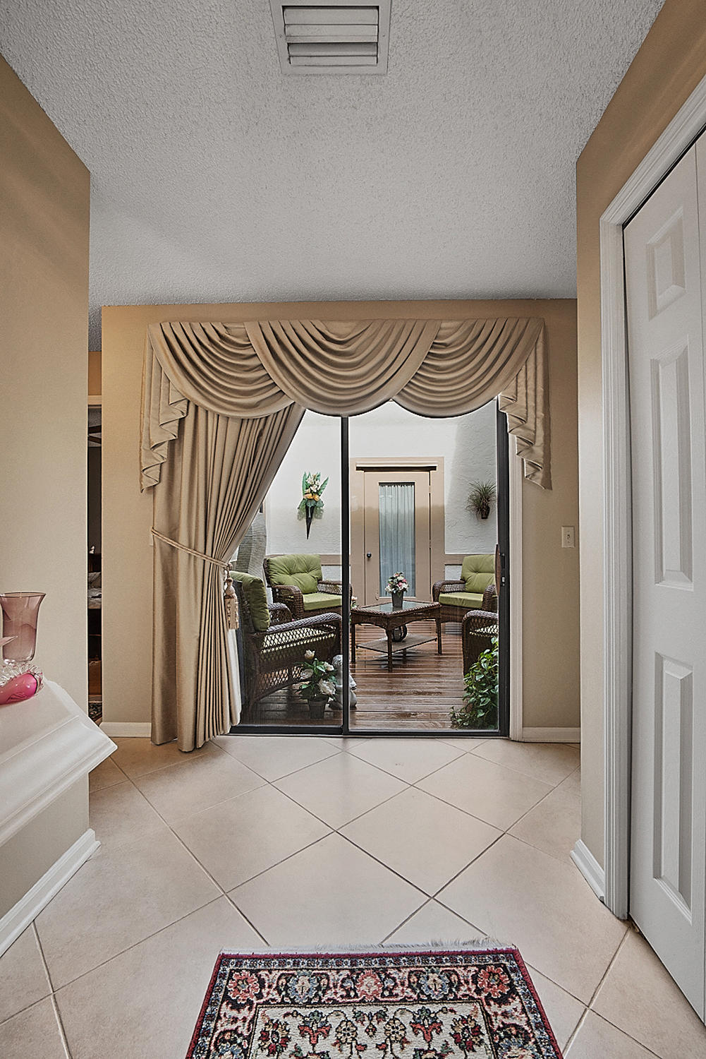 10404 Islander Drive Boca Raton, FL 33498 - Photo 16 of 44 Front Door View of Foyer and Atrium
