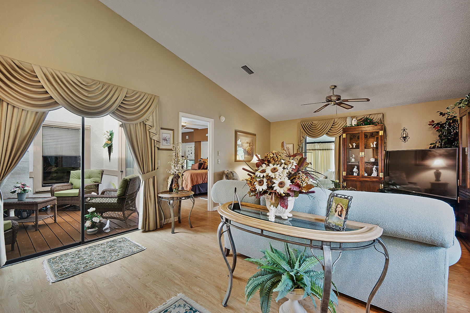 10404 Islander Drive Boca Raton, FL 33498 - Photo 22 of 44 Vaulted Ceiling Living Room w/ Atrium