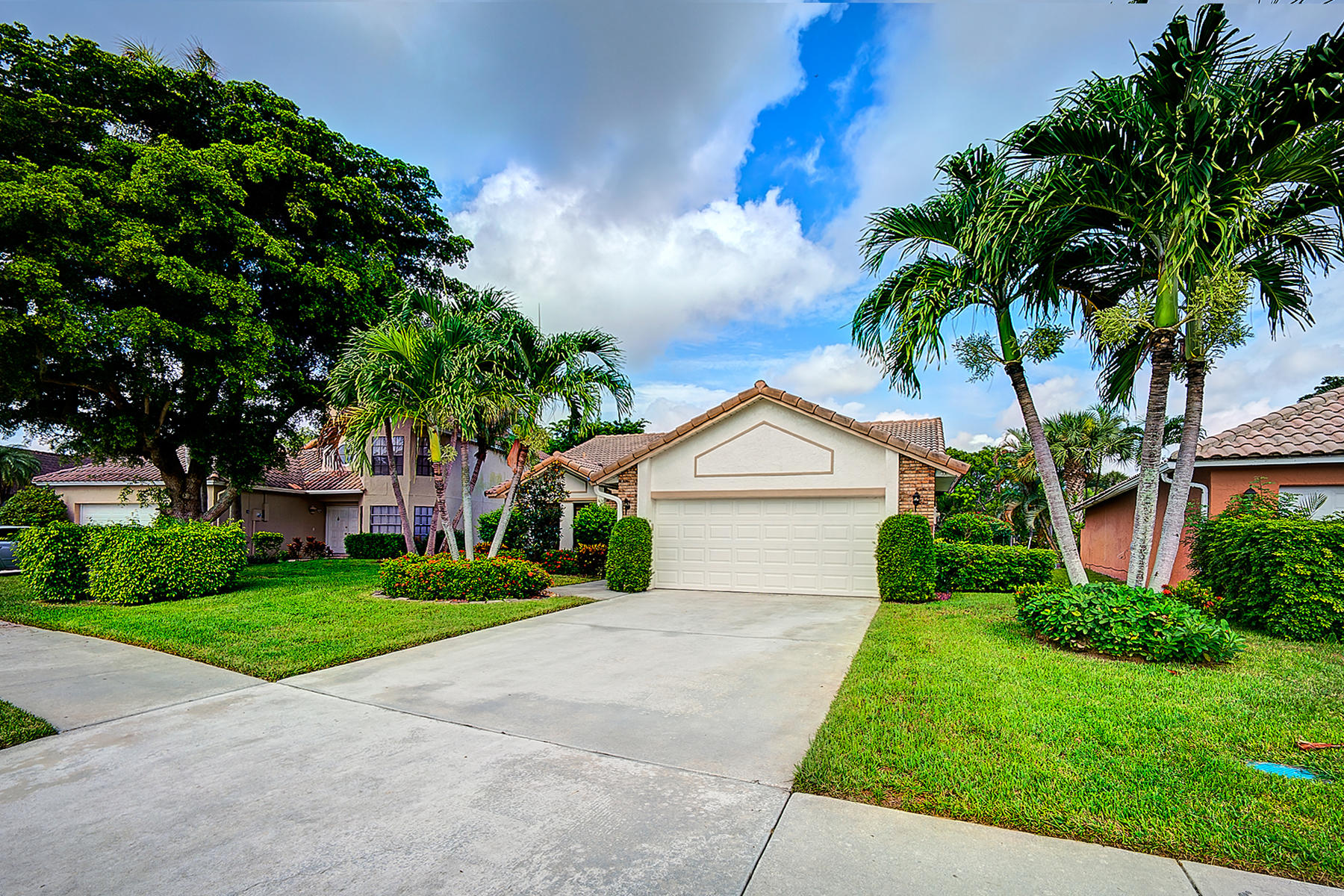 10404 Islander Drive Boca Raton, FL 33498 - Photo 33 of 44 Two Car Garage & Driveway