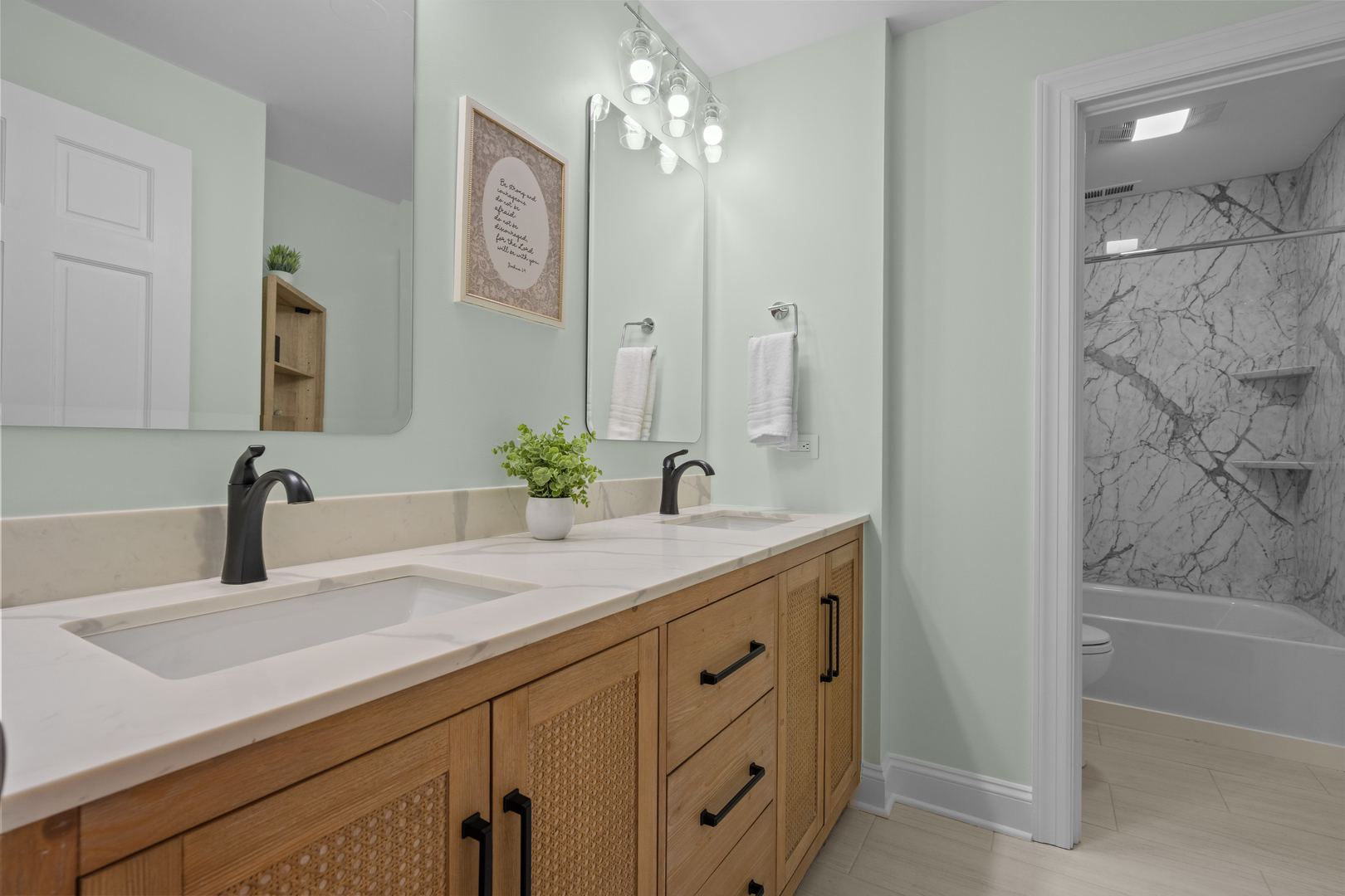 842 Lyster Road Highwood, IL 60040 - Photo 19 of 26 a bathroom with a sink and a mirror