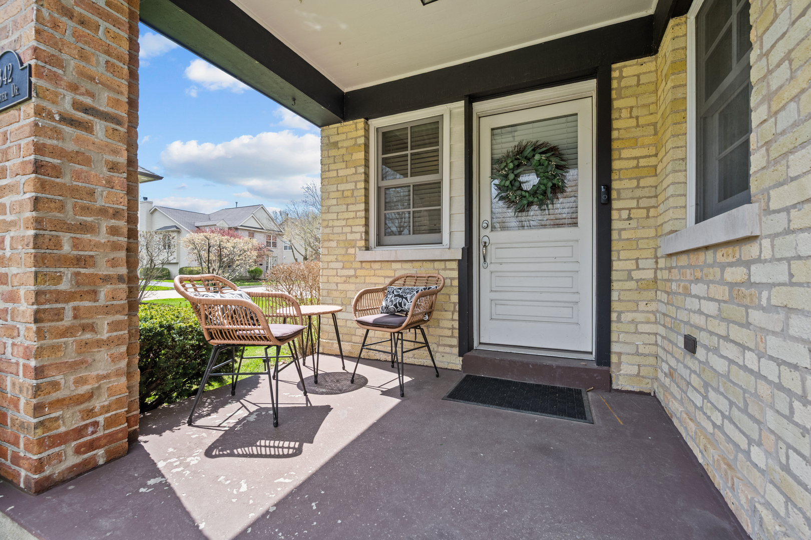 842 Lyster Road Highwood, IL 60040 - Photo 3 of 26 a view of a patio with table and chairs and potted plants