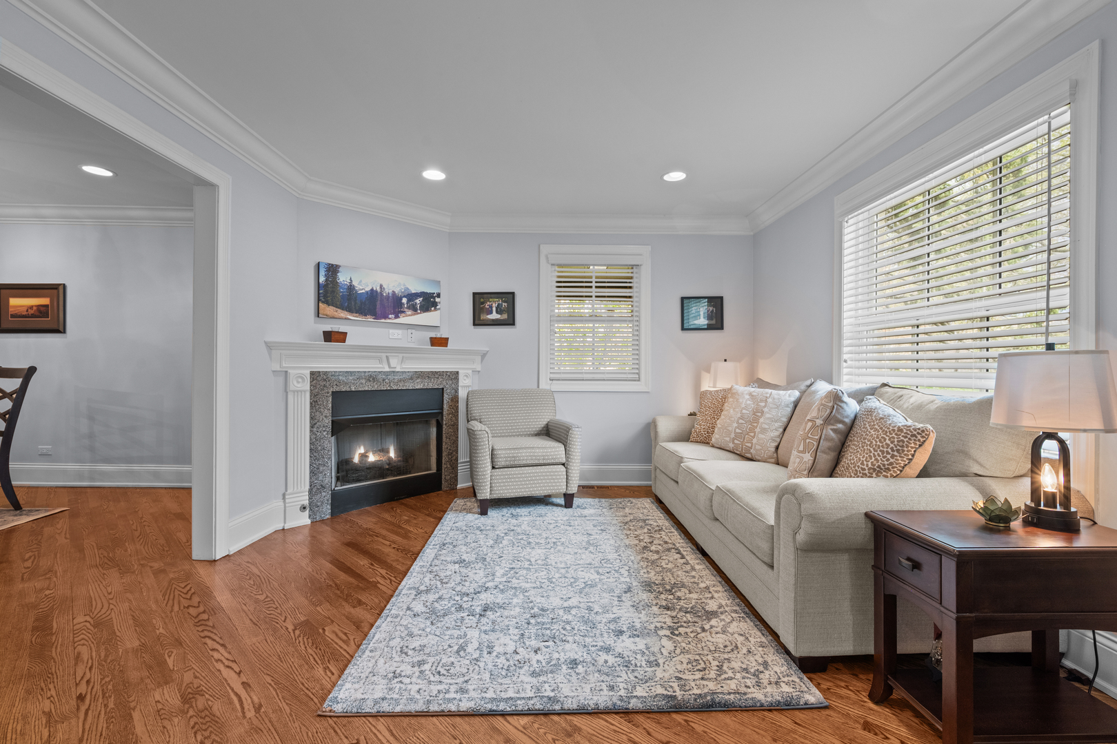 842 Lyster Road Highwood, IL 60040 - Photo 6 of 26 a living room with furniture and a fireplace