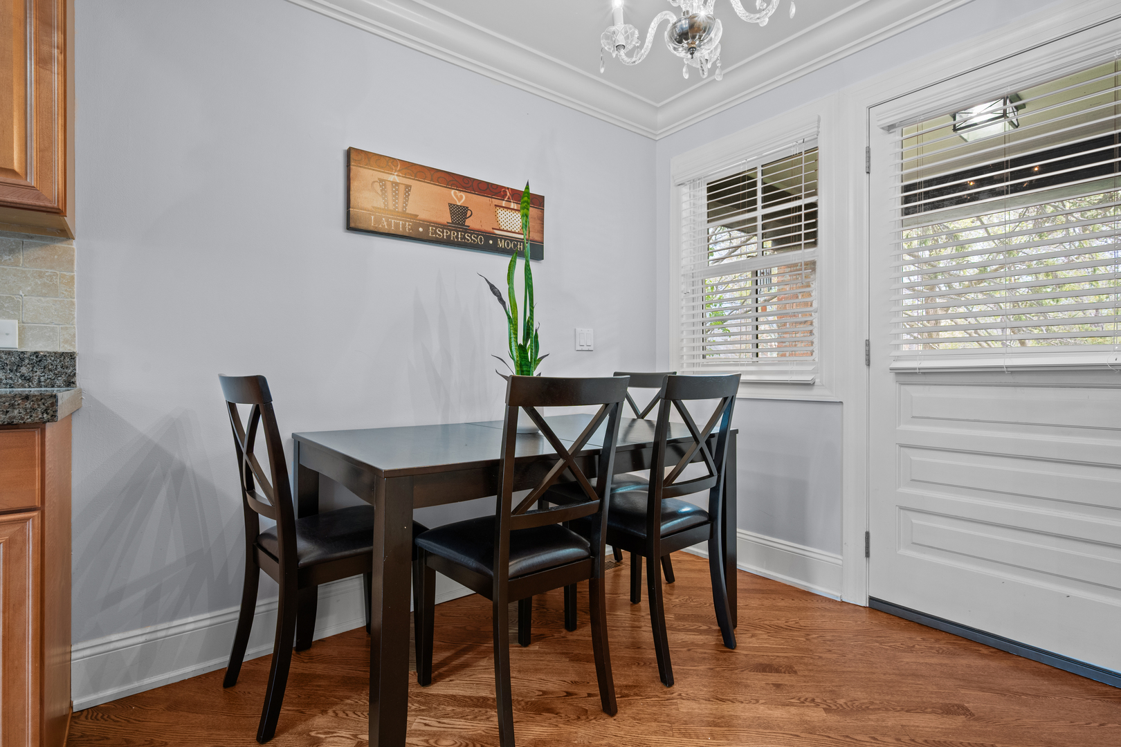 842 Lyster Road Highwood, IL 60040 - Photo 10 of 26 a view of a dining room with furniture and wooden floor