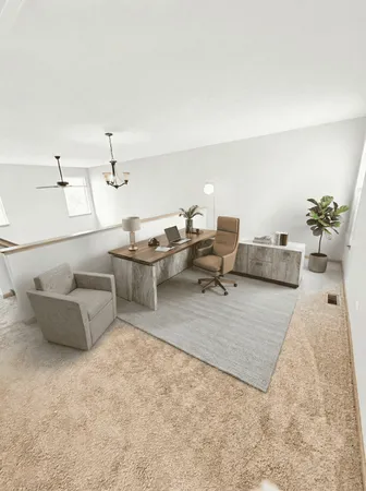 a living room with couches and kitchen view