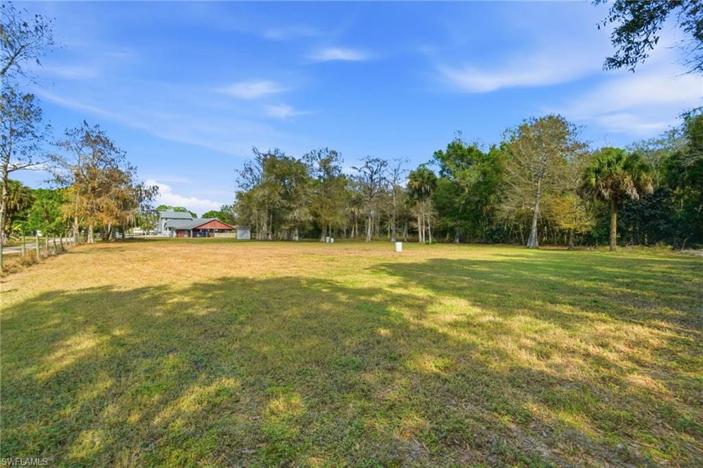 5860 Dogwood Way Naples, FL 34116 - Photo 18 of 36 a view of a tennis court