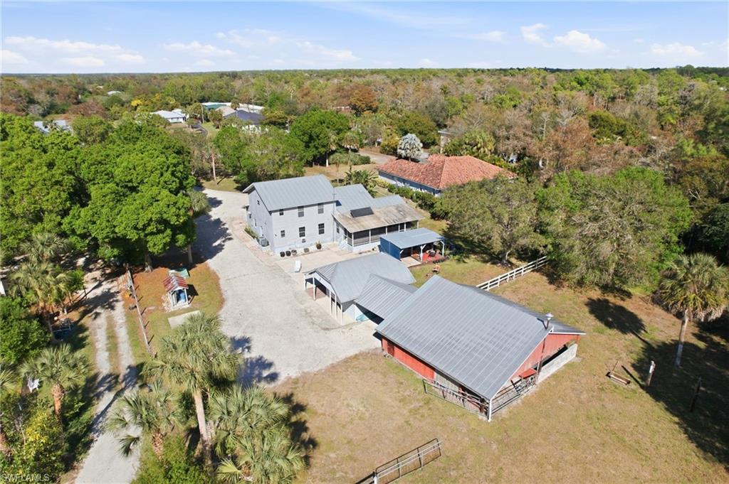 5860 Dogwood Way Naples, FL 34116 - Photo 25 of 36 an aerial view of a house with a yard