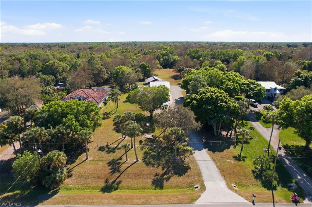 5860 Dogwood Way Naples, FL 34116 - Photo 26 of 36 a view of a garden