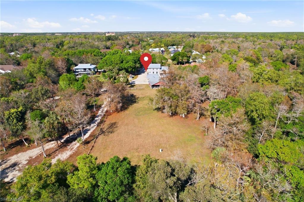 5860 Dogwood Way Naples, FL 34116 - Photo 35 of 36 a view of a city