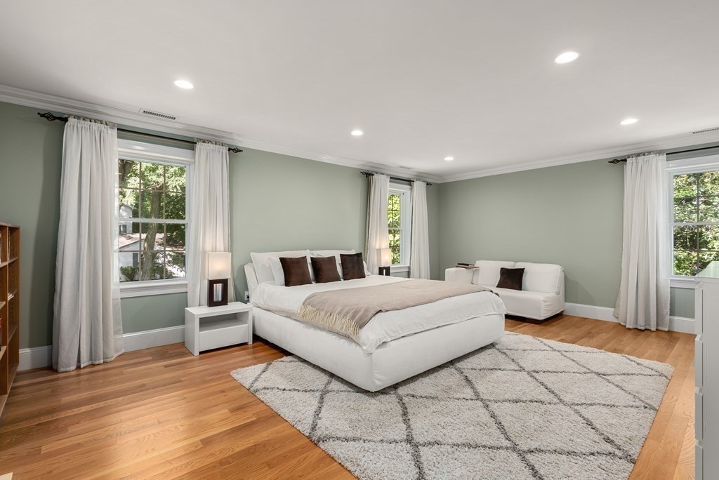 22 Dunedin Road Wellesley, MA 02481 - Photo 11 of 16 a spacious bedroom with a large bed and a window