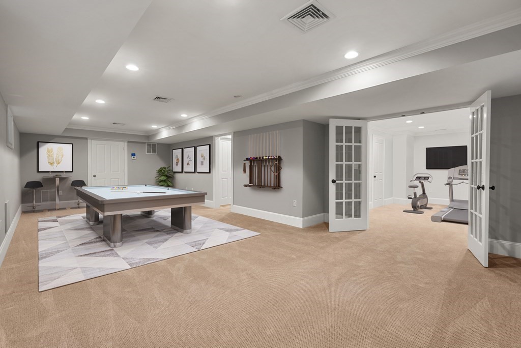 22 Dunedin Road Wellesley, MA 02481 - Photo 15 of 16 a living room with furniture and a flat screen tv