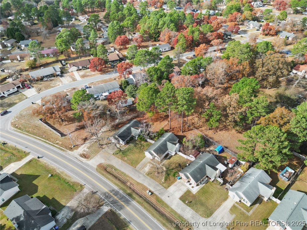 1132 Hoke Loop Road Fayetteville, NC 28314 - Photo 3 of 29 an aerial view of residential houses with outdoor space
