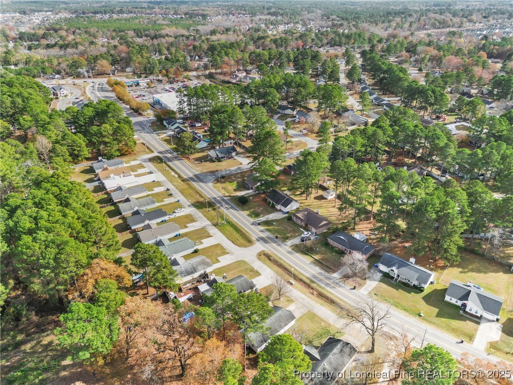 1132 Hoke Loop Road Fayetteville, NC 28314 - Photo 4 of 29 an aerial view of residential houses with outdoor space