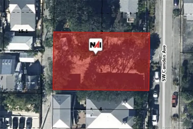 a sign that is on a brick wall