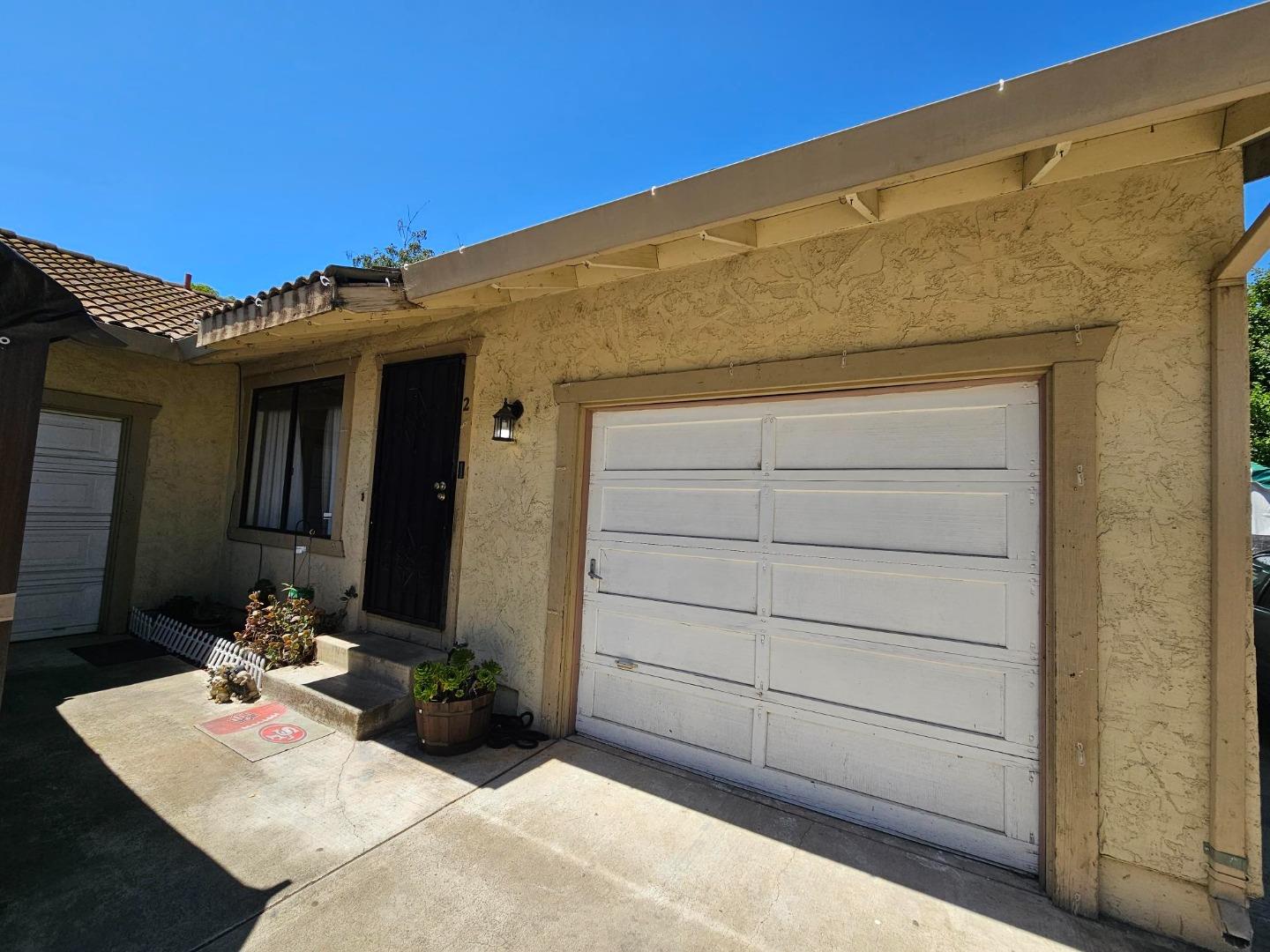 6725 Imperial Drive Gilroy, CA 95020 - Photo 4 of 8 a view of a house with a wooden floor and a potted plant