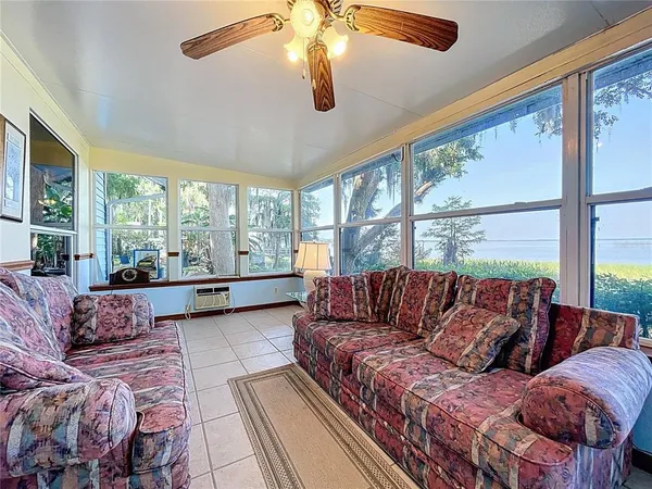 a kitchen with a sink and a microwave