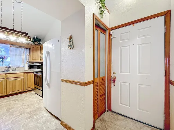 a bathroom with a toilet a sink and bathtub