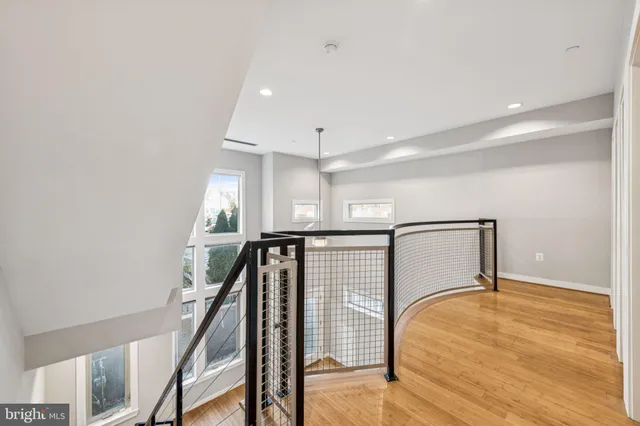 a view of entryway with wooden floor