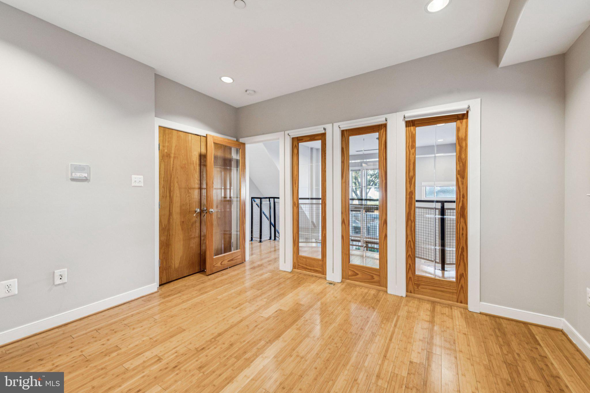 241 R Street Northeast, Unit A Washington, DC 20002 - Photo 20 of 33 wooden floor and windows in a room