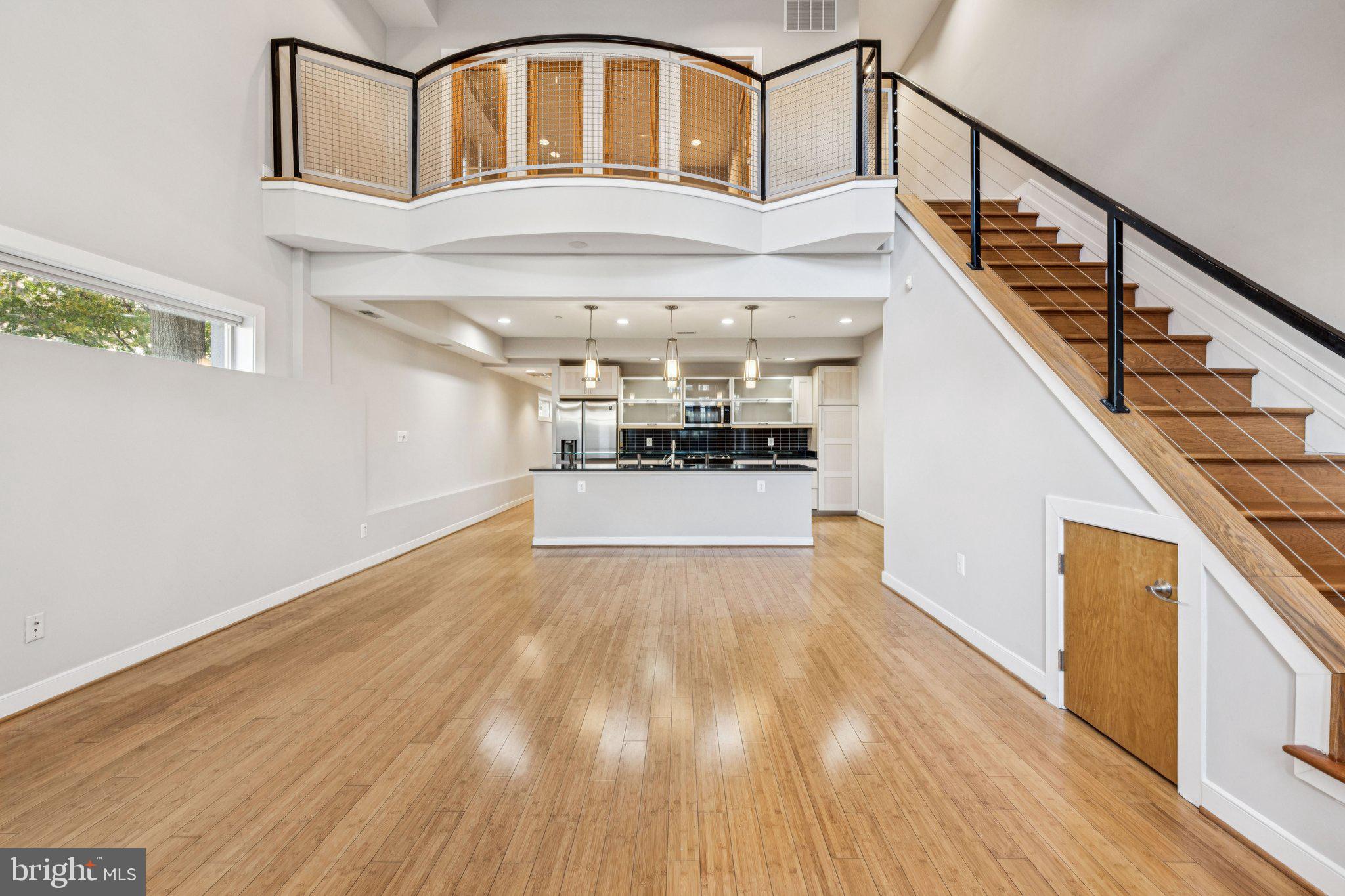 241 R Street Northeast, Unit A Washington, DC 20002 - Photo 2 of 33 a view of entryway and hall with wooden floor