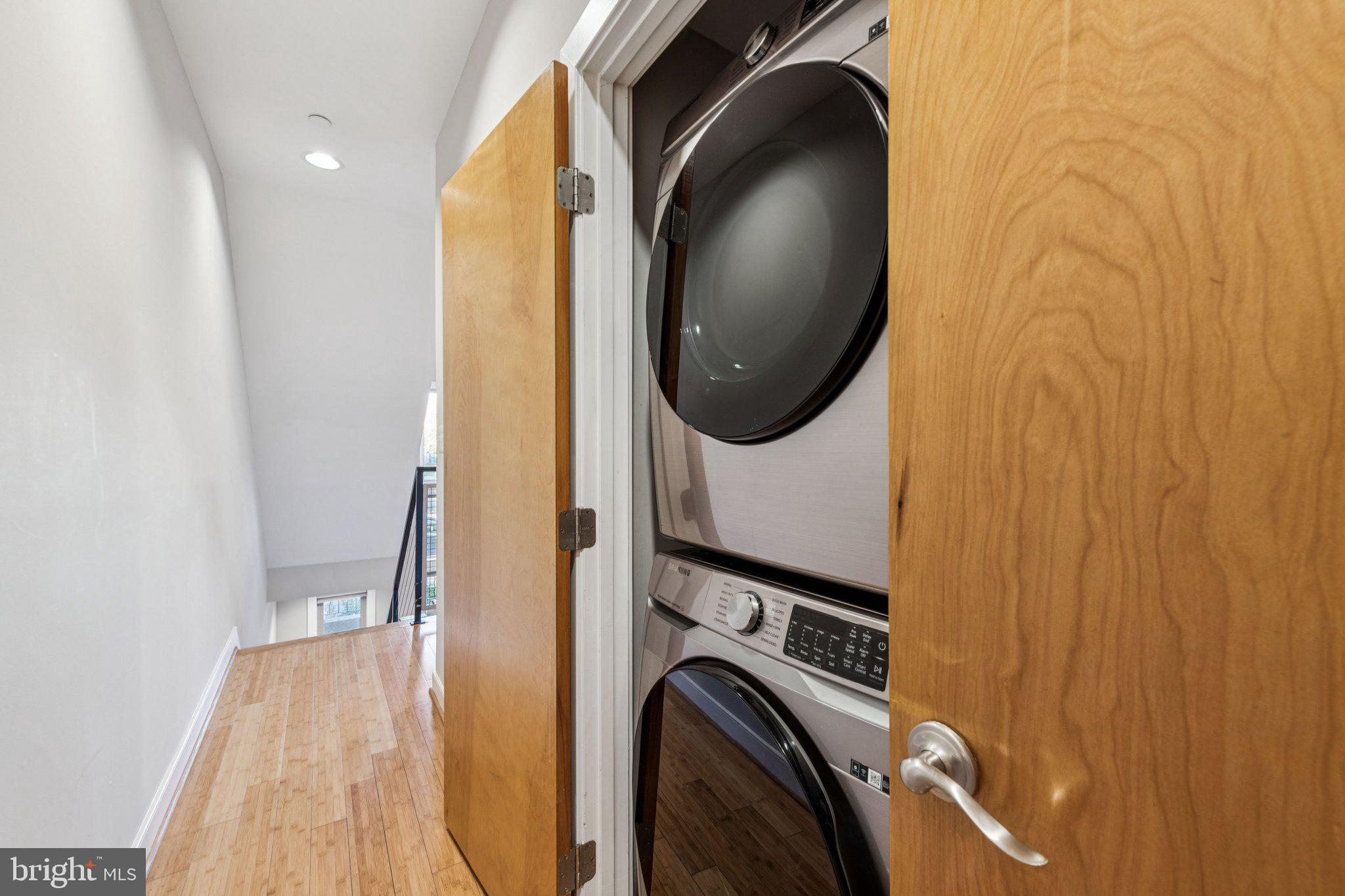 241 R Street Northeast, Unit A Washington, DC 20002 - Photo 26 of 33 a view of a hallway with washer and dryer