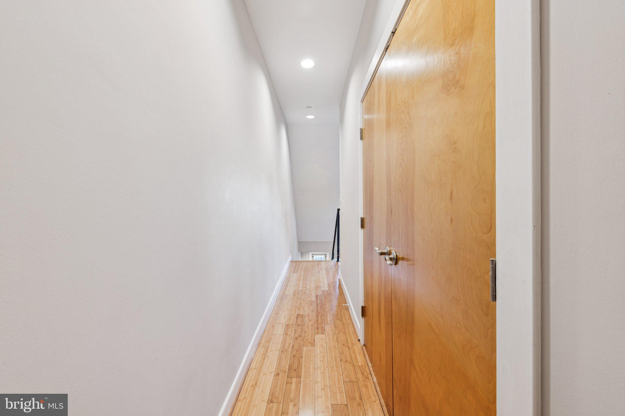 241 R Street Northeast, Unit A Washington, DC 20002 - Photo 27 of 33 a view of a hallway with wooden floor