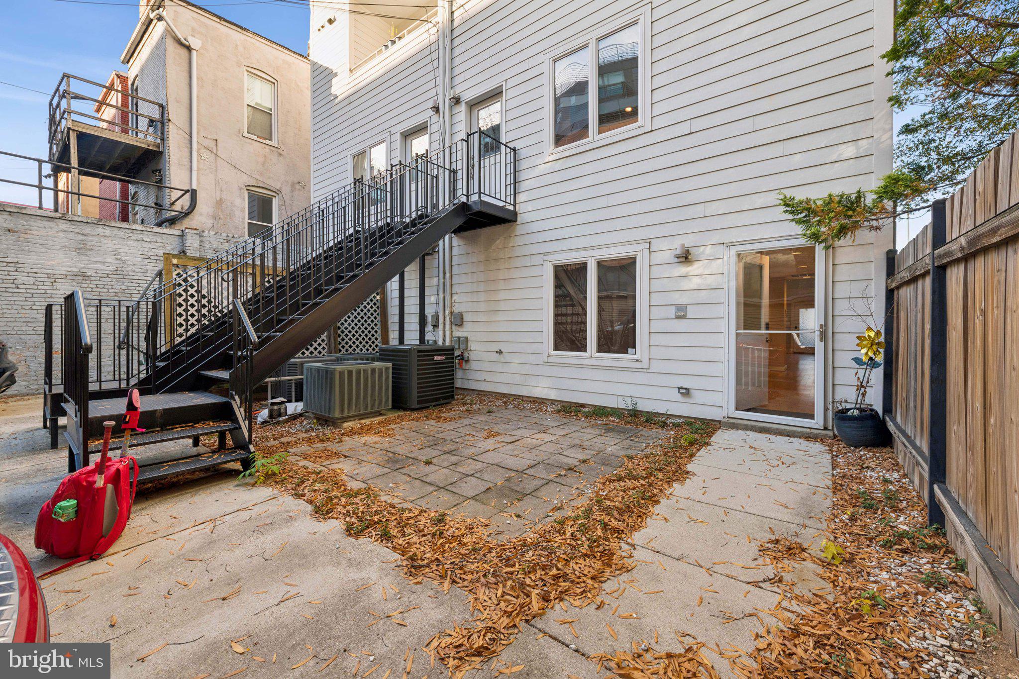 241 R Street Northeast, Unit A Washington, DC 20002 - Photo 29 of 33 a view of a house with entryway and wooden stairs