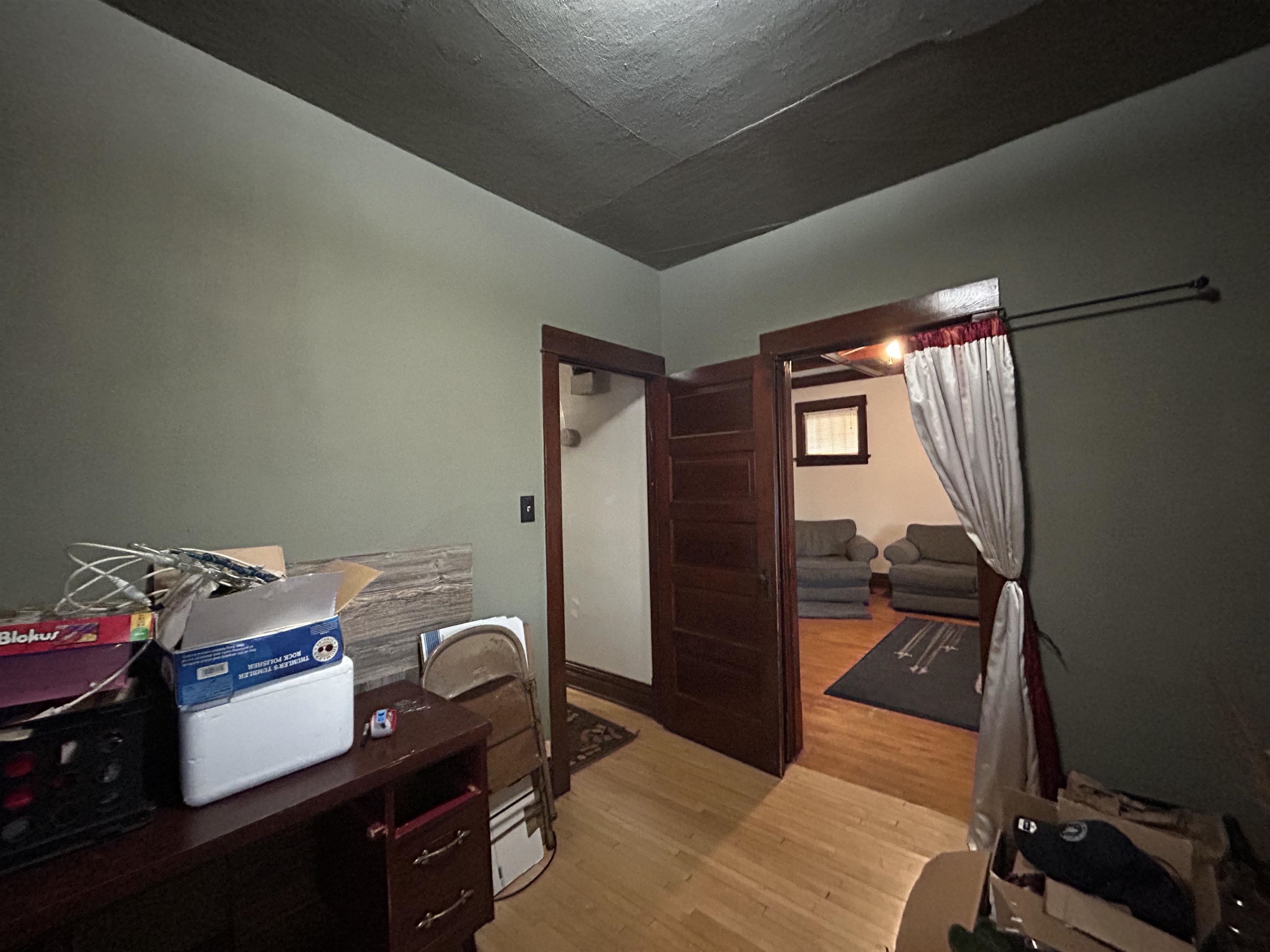 910 North 20th Street Superior, WI 54880 - Photo 22 of 39 Office area featuring light wood-type flooring and a textured ceiling