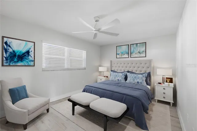 a bed room with a bed and a couch