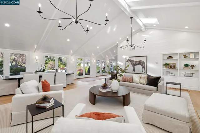 a large kitchen with stainless steel appliances lots of counter top space