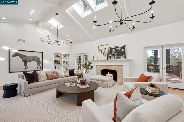 a kitchen with stainless steel appliances granite countertop a stove and a sink