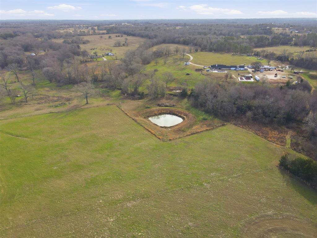 775 County Road 4919 Quitman, TX 75783 - Photo 17 of 19 a view of a lake with a city
