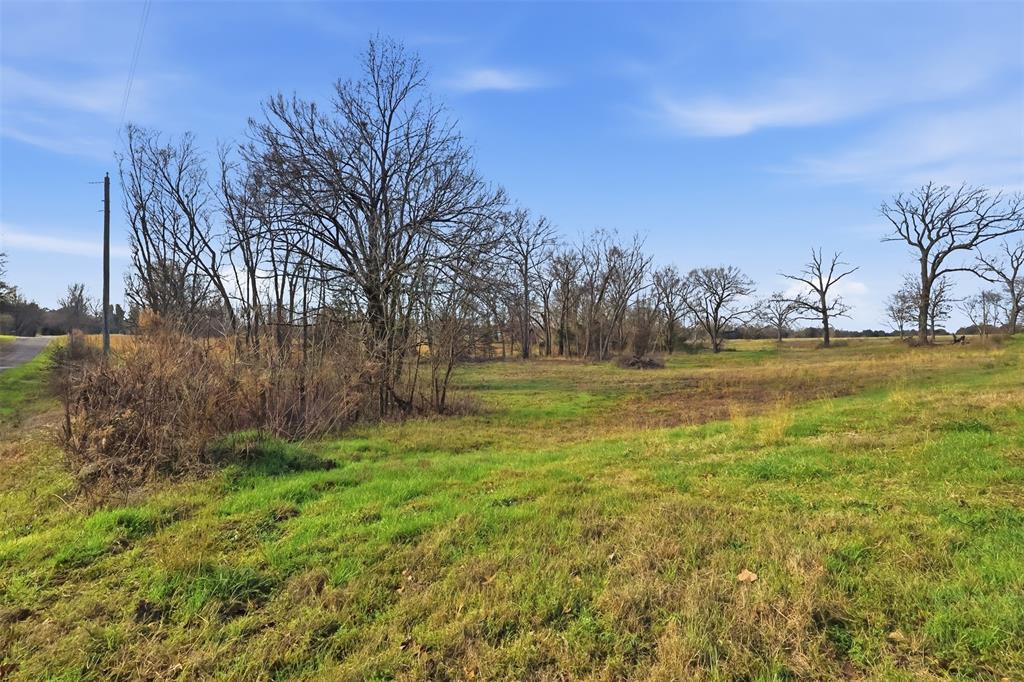 775 County Road 4919 Quitman, TX 75783 - Photo 5 of 19 a view of a lake with a big yard