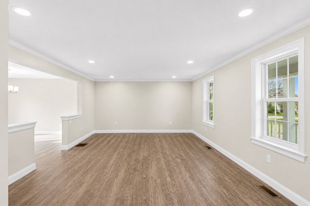 1001 Bay Street Fall River, MA 02724 - Photo 29 of 37 an empty room with wooden floor and windows