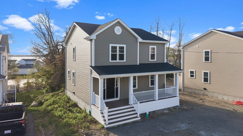 1001 Bay Street Fall River, MA 02724 - Photo 33 of 37 a front view of a house with a garden