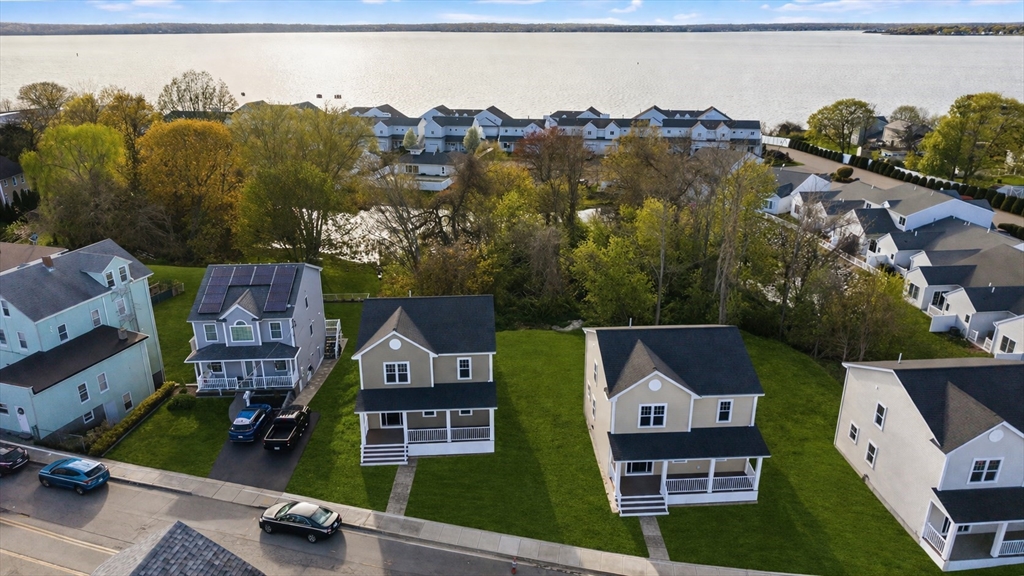 1001 Bay Street Fall River, MA 02724 - Photo 37 of 37 an aerial view of multiple houses with a yard