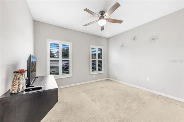 a view of an empty room with a workspace