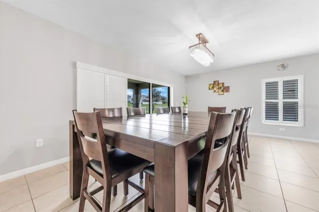 a kitchen with stainless steel appliances a sink a counter top space and cabinets