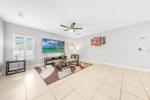 a living room with furniture and a couch