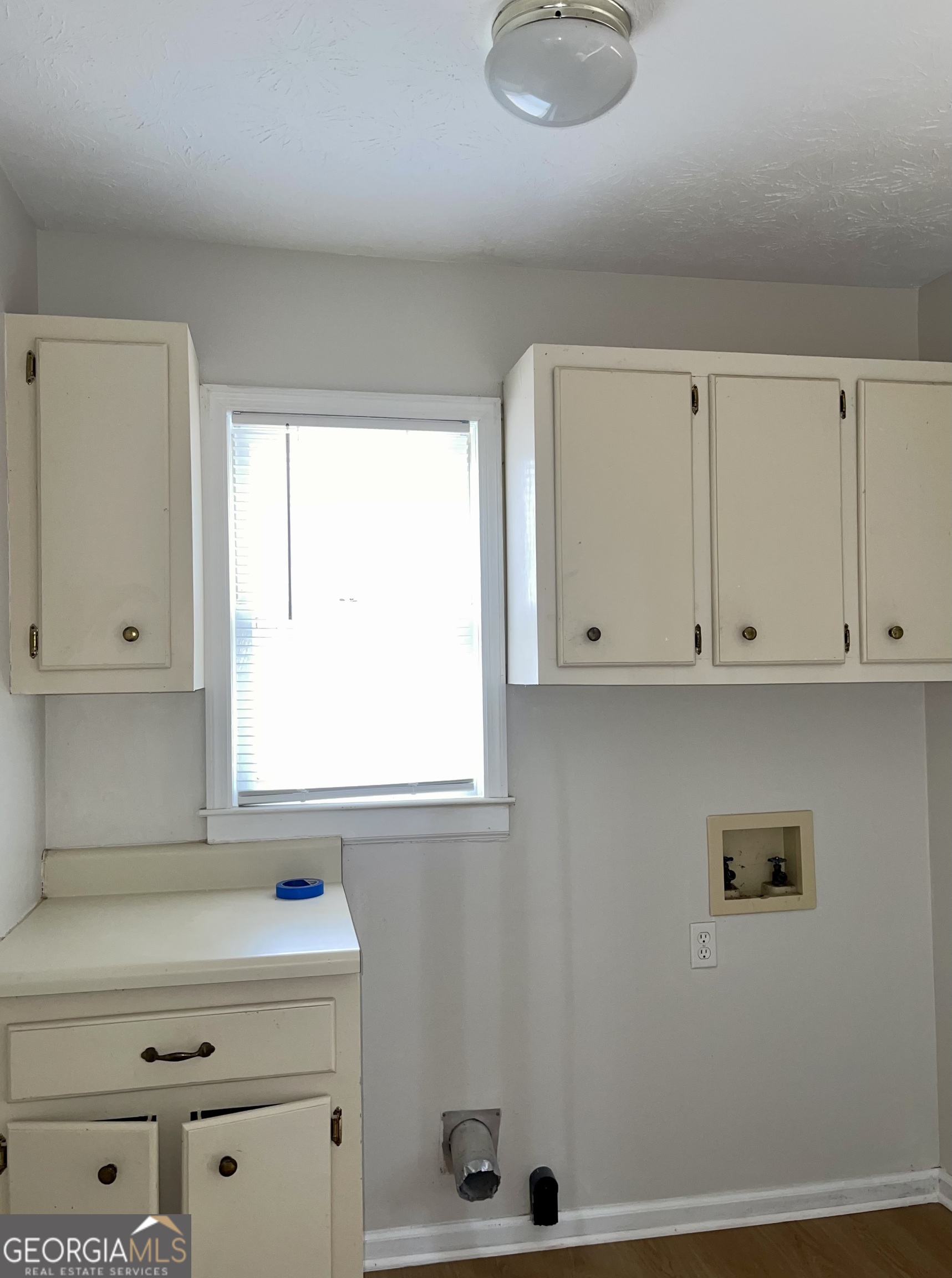 764 Hemphill Road Stockbridge, GA 30281 - Photo 13 of 14 a view of cabinets and window