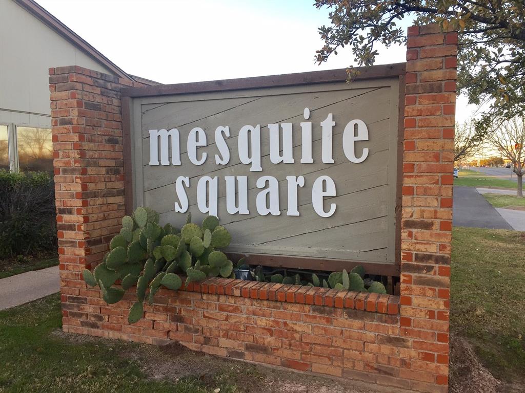 750 North Judge Ely Boulevard, Unit 127 Abilene, TX 79601 - Photo 1 of 13 a sign on the side of a building