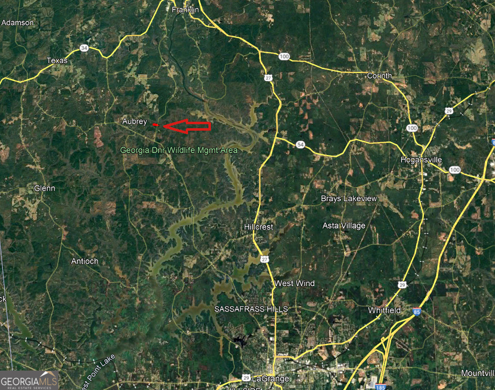 0 Bevis Rd Parcel 4 Franklin, GA 30217 - Photo 3 of 6 a backyard of a building and trees