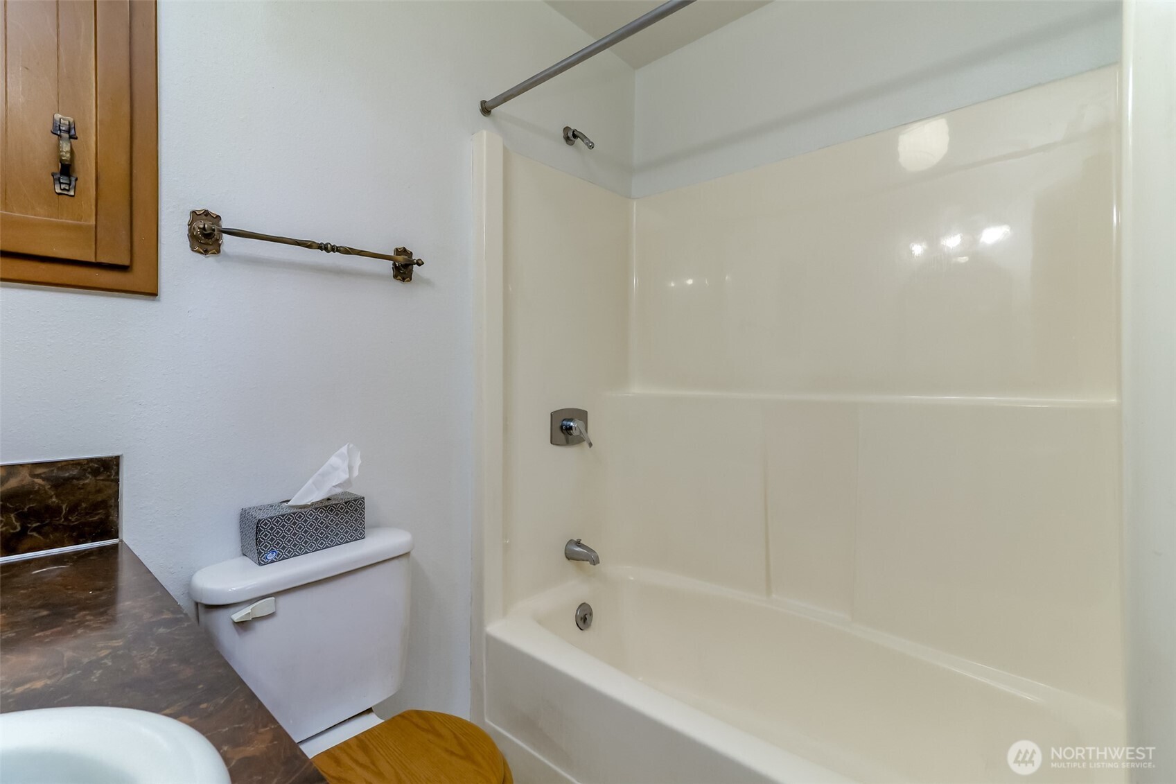 4701 292nd Street East Graham, WA 98338 - Photo 25 of 40 a bathroom with a toilet and a tub