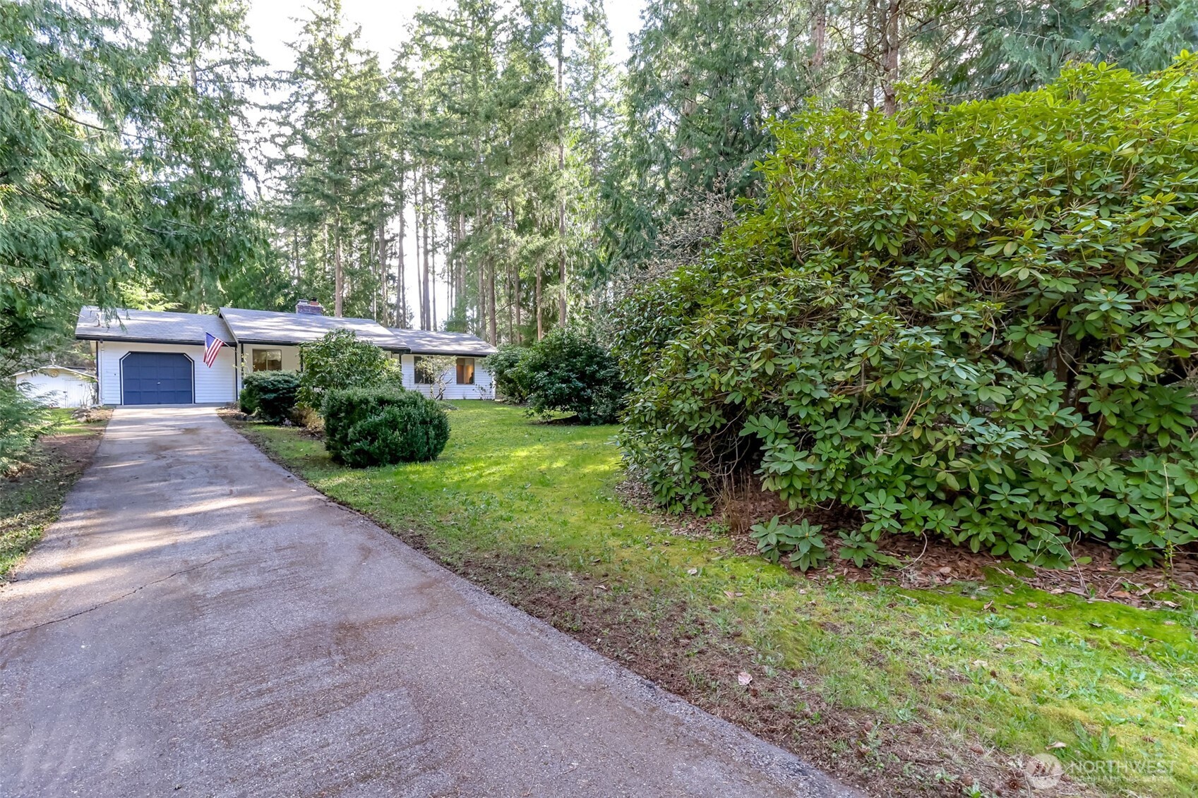4701 292nd Street East Graham, WA 98338 - Photo 39 of 40 a front view of a house with yard and green space