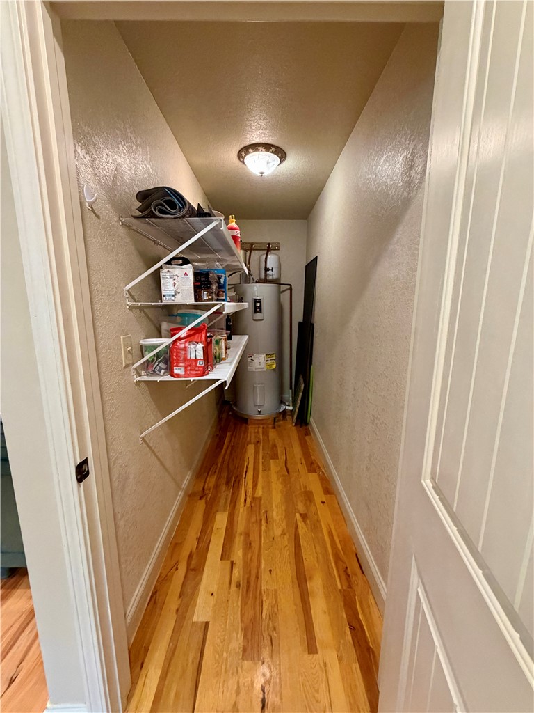232 Hunters Trail Walhalla, SC 29691 - Photo 16 of 38 This functional utility space features a hot water heater and durable wood flooring.