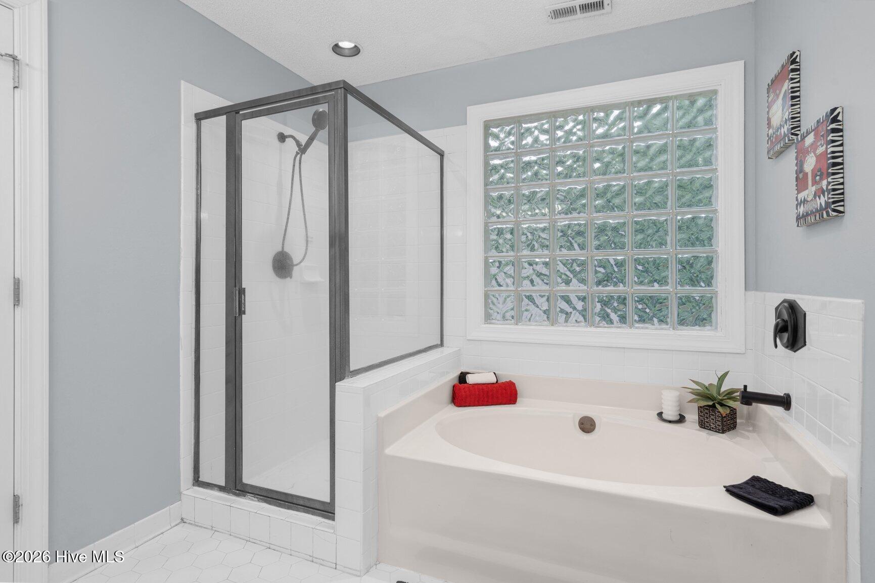 1732 Acorn Ridge Road Rocky Mount, NC 27804 - Photo 27 of 32 Shower and Soaking Tub