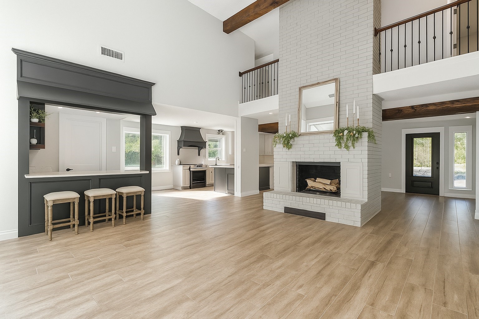 211 Garden West Conroe, TX 77304 - Photo 12 of 35 Moving our tour indoors... in the country your guests enter through the back door - this is the stunning view of the family room they will be greeted with. Notice how the stately gas fireplace anchors this space.