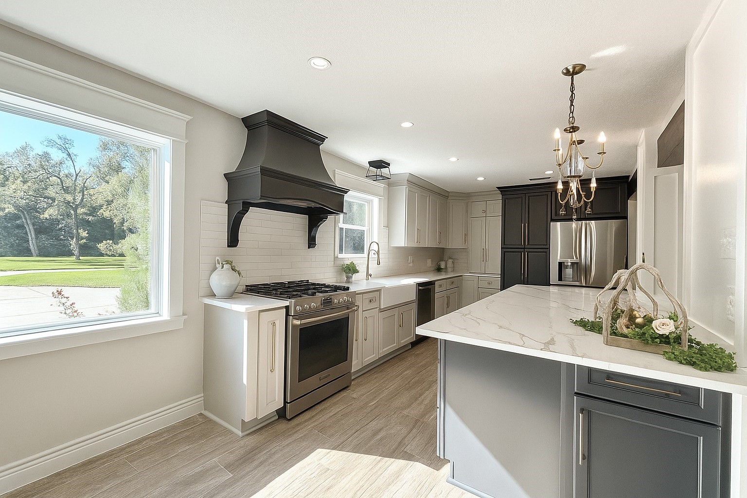 211 Garden West Conroe, TX 77304 - Photo 14 of 35 Look at this fantastic kitchen with all new appliances, two-tone cabinets, custom range hood and quartz countertops. The Breakfast room window provides plenty of natural light and is the perfect spot for morning coffee.