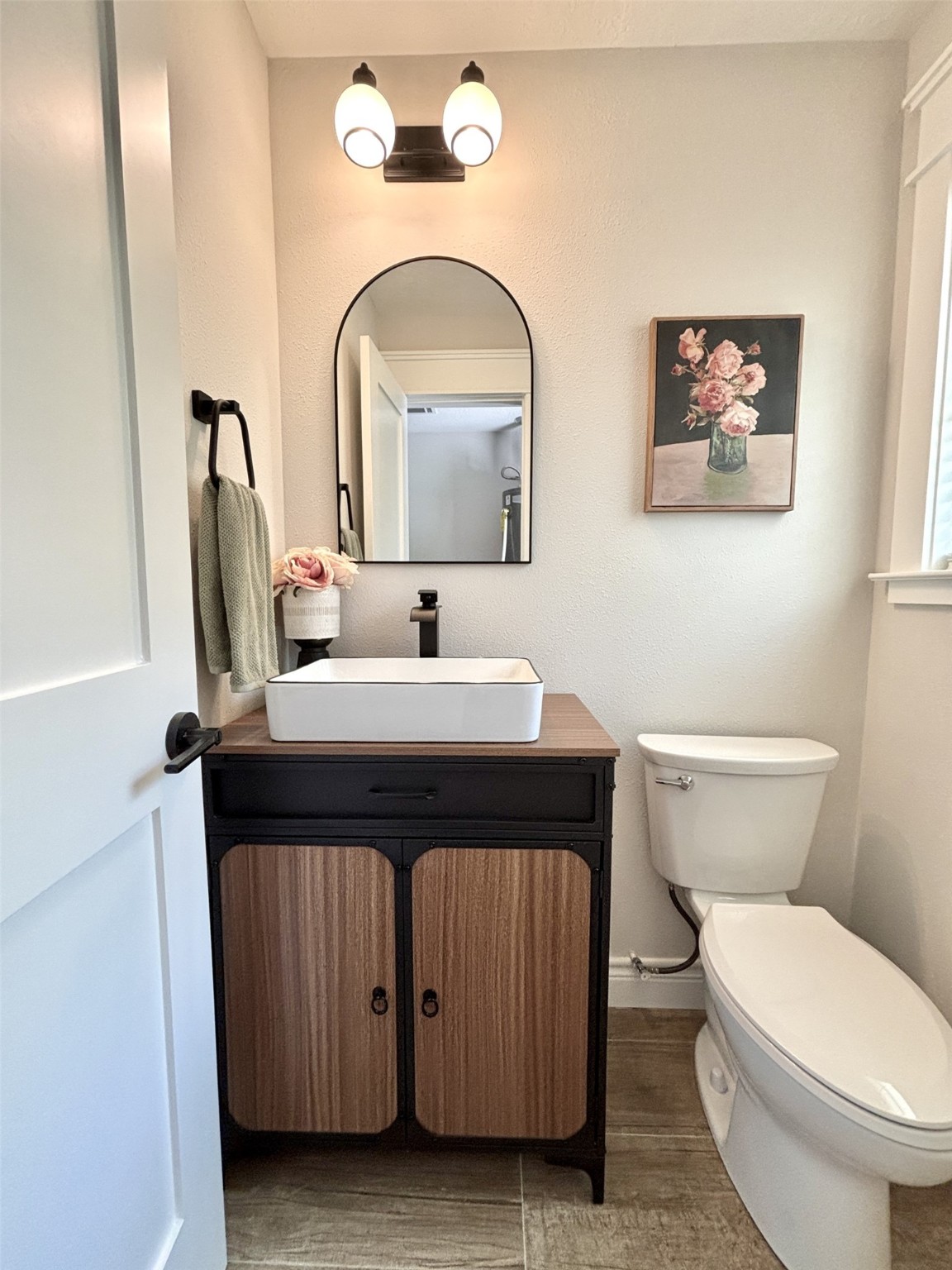 211 Garden West Conroe, TX 77304 - Photo 23 of 35 Adorable half bath located downstairs for your guests.