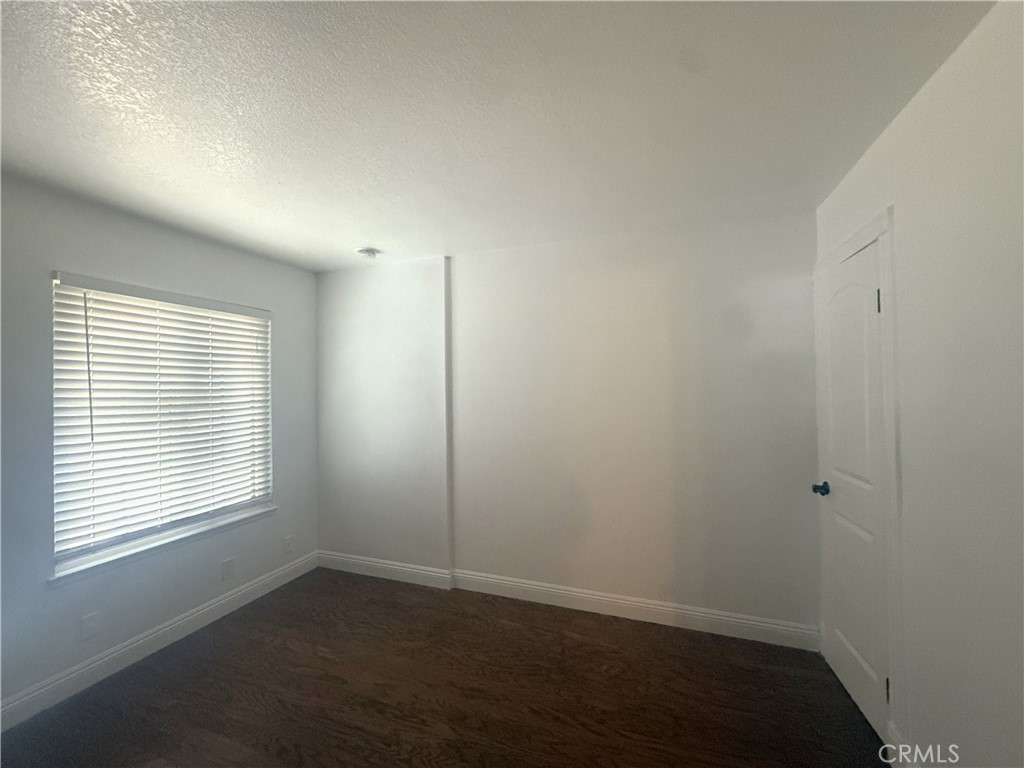 977 Wellington Road San Dimas, CA 91773 - Photo 8 of 20 an empty room with a window