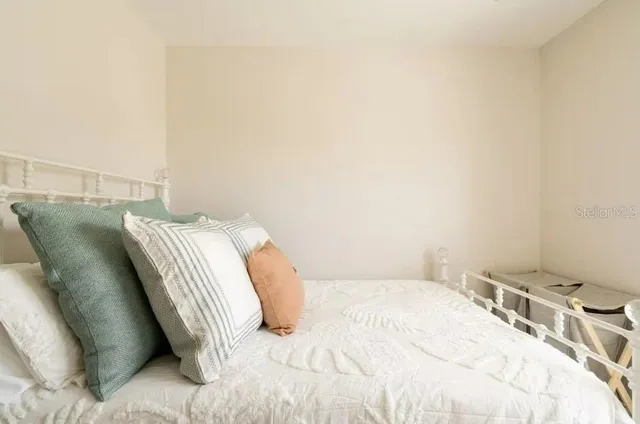 a bedroom with a bed